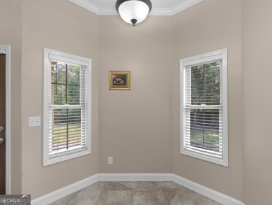 This gorgeous 3 bedroom/2.5 bathroom brick home is located on on Canongate At Georgia National Golf Club in Georgia - for sale on GolfHomes.com, golf home, golf lot