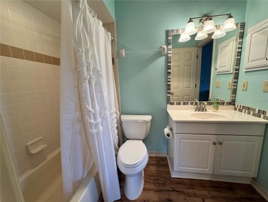 Well maintained END UNIT with WATER VIEW, spacious HIGH CEILINGS on The Meadows Golf and Country Club in Florida - for sale on GolfHomes.com, golf home, golf lot
