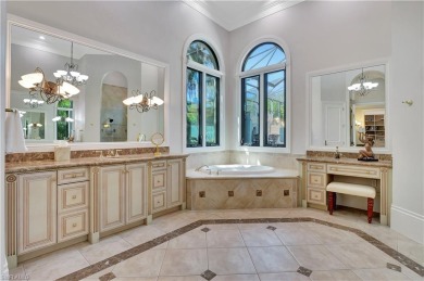 Discover unparalleled luxury at 6489 Highcroft Drive, an on Quail West Golf and Country Club in Florida - for sale on GolfHomes.com, golf home, golf lot