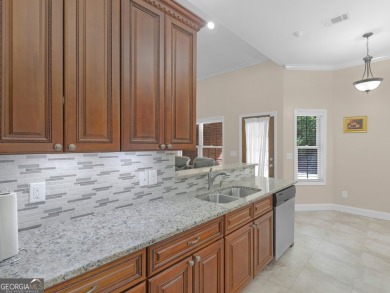 This gorgeous 3 bedroom/2.5 bathroom brick home is located on on Canongate At Georgia National Golf Club in Georgia - for sale on GolfHomes.com, golf home, golf lot
