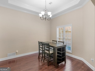 This gorgeous 3 bedroom/2.5 bathroom brick home is located on on Canongate At Georgia National Golf Club in Georgia - for sale on GolfHomes.com, golf home, golf lot