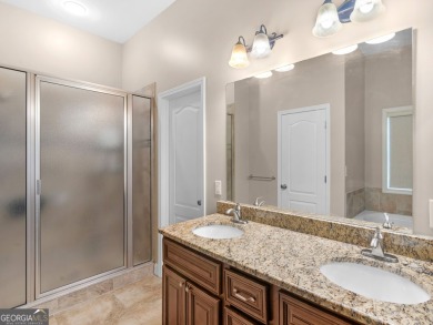 This gorgeous 3 bedroom/2.5 bathroom brick home is located on on Canongate At Georgia National Golf Club in Georgia - for sale on GolfHomes.com, golf home, golf lot