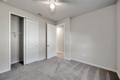 Don't miss your chance to own the stunning Topsail model home in on The Golf Club of Cypress Creek in Florida - for sale on GolfHomes.com, golf home, golf lot