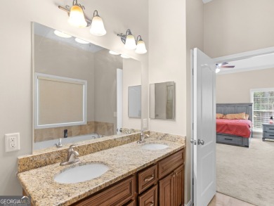This gorgeous 3 bedroom/2.5 bathroom brick home is located on on Canongate At Georgia National Golf Club in Georgia - for sale on GolfHomes.com, golf home, golf lot