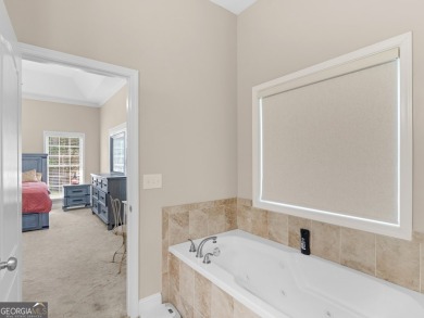 This gorgeous 3 bedroom/2.5 bathroom brick home is located on on Canongate At Georgia National Golf Club in Georgia - for sale on GolfHomes.com, golf home, golf lot