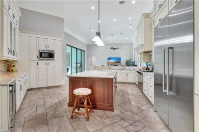 Discover unparalleled luxury at 6489 Highcroft Drive, an on Quail West Golf and Country Club in Florida - for sale on GolfHomes.com, golf home, golf lot