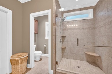 This beautiful 3 or 4-bedroom, 3.5-bath home is nestled on a on The Patriot Golf Club At Grand Harbor in South Carolina - for sale on GolfHomes.com, golf home, golf lot