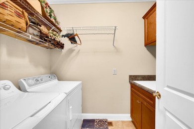 This beautiful 3 or 4-bedroom, 3.5-bath home is nestled on a on The Patriot Golf Club At Grand Harbor in South Carolina - for sale on GolfHomes.com, golf home, golf lot