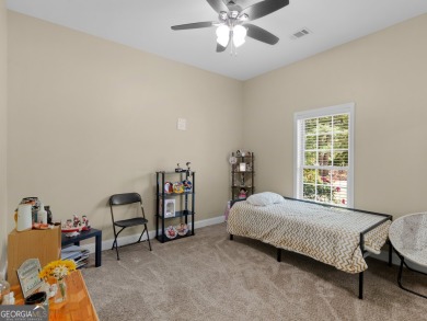 This gorgeous 3 bedroom/2.5 bathroom brick home is located on on Canongate At Georgia National Golf Club in Georgia - for sale on GolfHomes.com, golf home, golf lot
