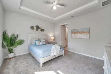 Don't miss your chance to own the stunning Topsail model home in on The Golf Club of Cypress Creek in Florida - for sale on GolfHomes.com, golf home, golf lot