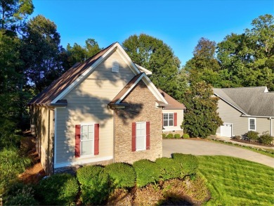 This beautiful 3 or 4-bedroom, 3.5-bath home is nestled on a on The Patriot Golf Club At Grand Harbor in South Carolina - for sale on GolfHomes.com, golf home, golf lot