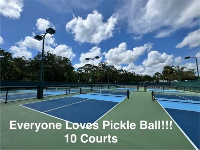 MOTIVATED SELLER! Bring Offers. FULLY FURNISHED END UNIT where on The Meadows Golf and Country Club in Florida - for sale on GolfHomes.com, golf home, golf lot