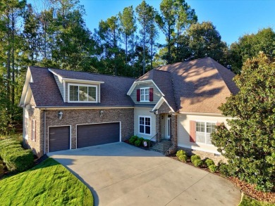 This beautiful 3 or 4-bedroom, 3.5-bath home is nestled on a on The Patriot Golf Club At Grand Harbor in South Carolina - for sale on GolfHomes.com, golf home, golf lot