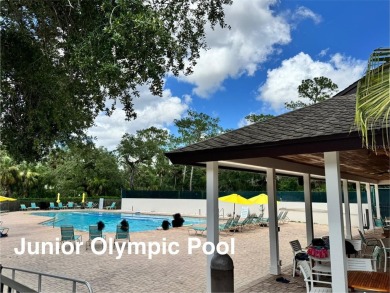 MOTIVATED SELLER! Bring Offers. FULLY FURNISHED END UNIT where on The Meadows Golf and Country Club in Florida - for sale on GolfHomes.com, golf home, golf lot