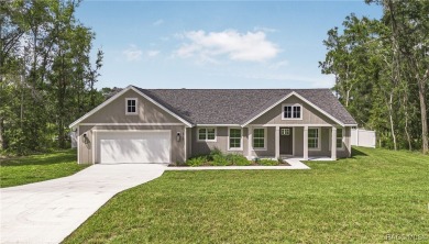 Enjoy the difference that award-winning quality makes in this on Citrus Springs Country Club in Florida - for sale on GolfHomes.com, golf home, golf lot