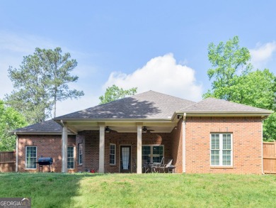 This gorgeous 3 bedroom/2.5 bathroom brick home is located on on Canongate At Georgia National Golf Club in Georgia - for sale on GolfHomes.com, golf home, golf lot