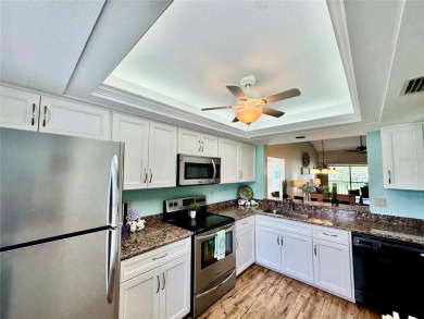 MOTIVATED SELLER! Bring Offers. FULLY FURNISHED END UNIT where on The Meadows Golf and Country Club in Florida - for sale on GolfHomes.com, golf home, golf lot