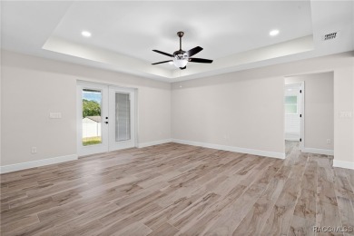 Enjoy the difference that award-winning quality makes in this on Citrus Springs Country Club in Florida - for sale on GolfHomes.com, golf home, golf lot
