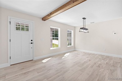 Enjoy the difference that award-winning quality makes in this on Citrus Springs Country Club in Florida - for sale on GolfHomes.com, golf home, golf lot