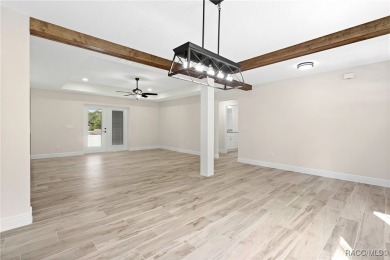 Enjoy the difference that award-winning quality makes in this on Citrus Springs Country Club in Florida - for sale on GolfHomes.com, golf home, golf lot