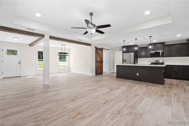 Enjoy the difference that award-winning quality makes in this on Citrus Springs Country Club in Florida - for sale on GolfHomes.com, golf home, golf lot