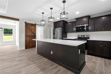 Enjoy the difference that award-winning quality makes in this on Citrus Springs Country Club in Florida - for sale on GolfHomes.com, golf home, golf lot