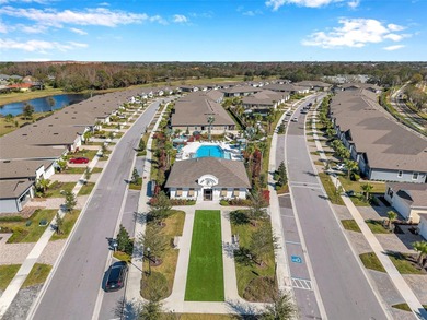 Don't miss your chance to own the stunning Topsail model home in on The Golf Club of Cypress Creek in Florida - for sale on GolfHomes.com, golf home, golf lot