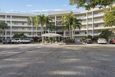 2-bed, 2-bath golf-view condo in the desirable all-ages Palm on Palm-Aire Country Club and Resort - The Oaks in Florida - for sale on GolfHomes.com, golf home, golf lot