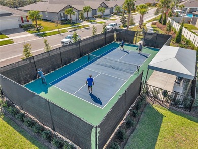 Don't miss your chance to own the stunning Topsail model home in on The Golf Club of Cypress Creek in Florida - for sale on GolfHomes.com, golf home, golf lot