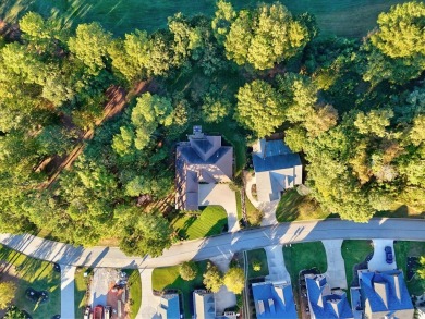 This beautiful 3 or 4-bedroom, 3.5-bath home is nestled on a on The Patriot Golf Club At Grand Harbor in South Carolina - for sale on GolfHomes.com, golf home, golf lot