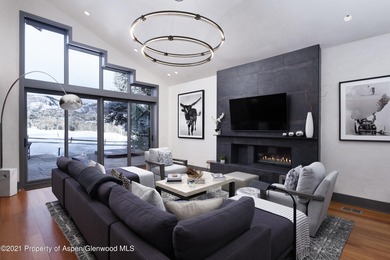 Clean lines and big views define this beautiful four-bedroom on The Snowmass Club in Colorado - for sale on GolfHomes.com, golf home, golf lot