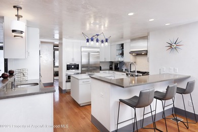 Clean lines and big views define this beautiful four-bedroom on The Snowmass Club in Colorado - for sale on GolfHomes.com, golf home, golf lot