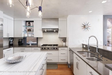 Clean lines and big views define this beautiful four-bedroom on The Snowmass Club in Colorado - for sale on GolfHomes.com, golf home, golf lot