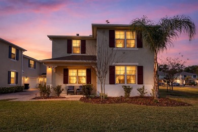 Situated on a corner lot, this contemporary two-story home with on Venetian Bay Golf Course in Florida - for sale on GolfHomes.com, golf home, golf lot