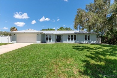 Are you looking for a beautiful home in a quiet neighborhood on LakeSide Country Club in Florida - for sale on GolfHomes.com, golf home, golf lot