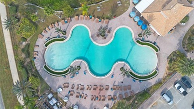 Situated on a corner lot, this contemporary two-story home with on Venetian Bay Golf Course in Florida - for sale on GolfHomes.com, golf home, golf lot