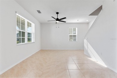 Situated on a corner lot, this contemporary two-story home with on Venetian Bay Golf Course in Florida - for sale on GolfHomes.com, golf home, golf lot