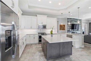 This beautifully enhanced WATER VIEW Augusta model set within on Rosedale Golf and Tennis Club in Florida - for sale on GolfHomes.com, golf home, golf lot