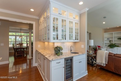 Experience the pinnacle of lakefront living in this immaculate on Beacon Ridge Golf and Country Club in North Carolina - for sale on GolfHomes.com, golf home, golf lot