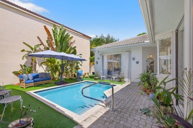 Rarely available single-story courtyard home perfectly situated on  in Florida - for sale on GolfHomes.com, golf home, golf lot