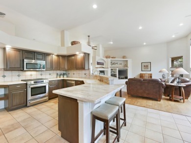 This perfectly placed adobe style home is right at the steps of on Tiara Rado Golf Course in Colorado - for sale on GolfHomes.com, golf home, golf lot