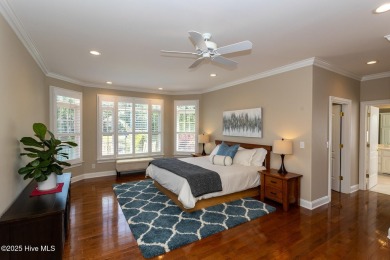 Experience the pinnacle of lakefront living in this immaculate on Beacon Ridge Golf and Country Club in North Carolina - for sale on GolfHomes.com, golf home, golf lot