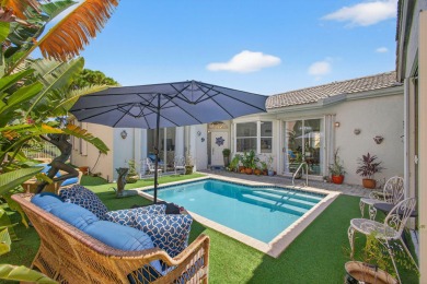 Rarely available single-story courtyard home perfectly situated on  in Florida - for sale on GolfHomes.com, golf home, golf lot