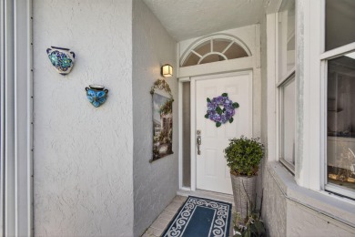 Rarely available single-story courtyard home perfectly situated on  in Florida - for sale on GolfHomes.com, golf home, golf lot