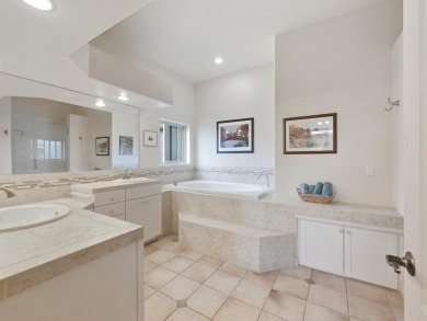 This perfectly placed adobe style home is right at the steps of on Tiara Rado Golf Course in Colorado - for sale on GolfHomes.com, golf home, golf lot