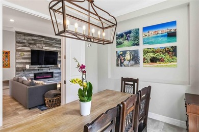 This beautifully enhanced WATER VIEW Augusta model set within on Rosedale Golf and Tennis Club in Florida - for sale on GolfHomes.com, golf home, golf lot