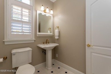 Experience the pinnacle of lakefront living in this immaculate on Beacon Ridge Golf and Country Club in North Carolina - for sale on GolfHomes.com, golf home, golf lot