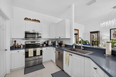 Rarely available single-story courtyard home perfectly situated on  in Florida - for sale on GolfHomes.com, golf home, golf lot