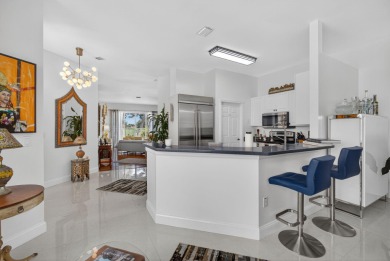 Rarely available single-story courtyard home perfectly situated on  in Florida - for sale on GolfHomes.com, golf home, golf lot