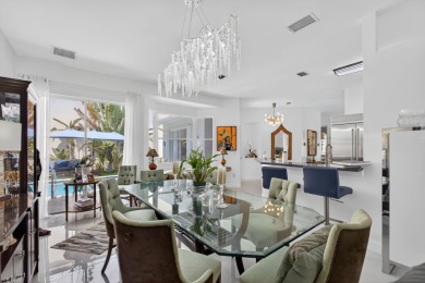 Rarely available single-story courtyard home perfectly situated on  in Florida - for sale on GolfHomes.com, golf home, golf lot